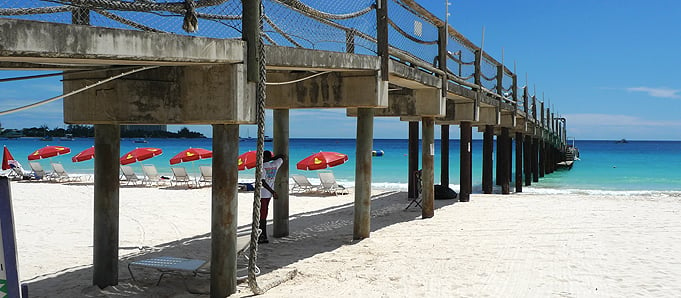 A wooden bridge on a beach in Barbados