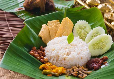 Nasi lemak served on a banana leaf