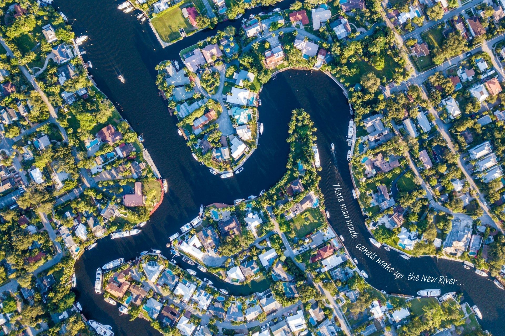 The New River, made up of man made canals, winds its way through a neighbourhood in Fort Lauderdale, Florida.