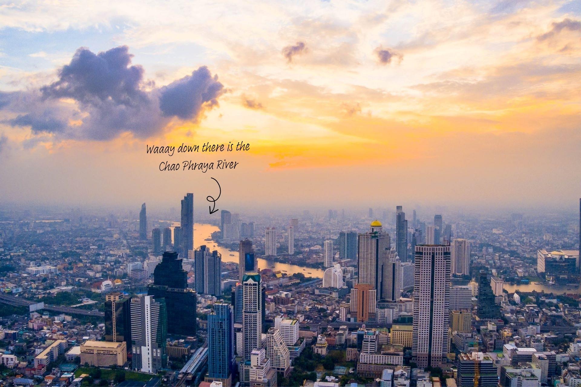 The Chao Phraya River runs through the centre of Bangkok, as seen from above.