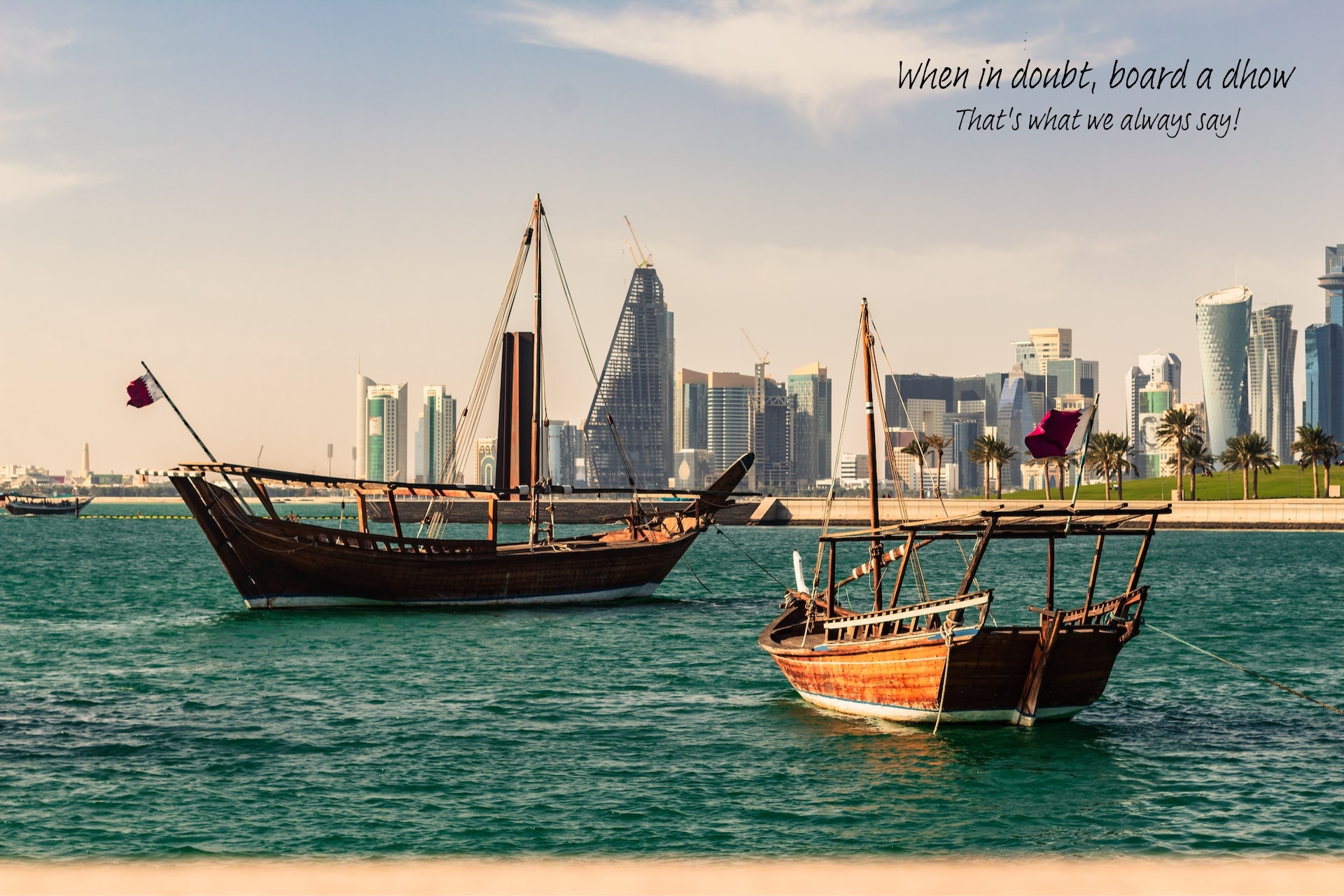 An image of 2 dhows, traditional boats from the Middle East. A scribbled note reads: When in doubt, board a dhow!