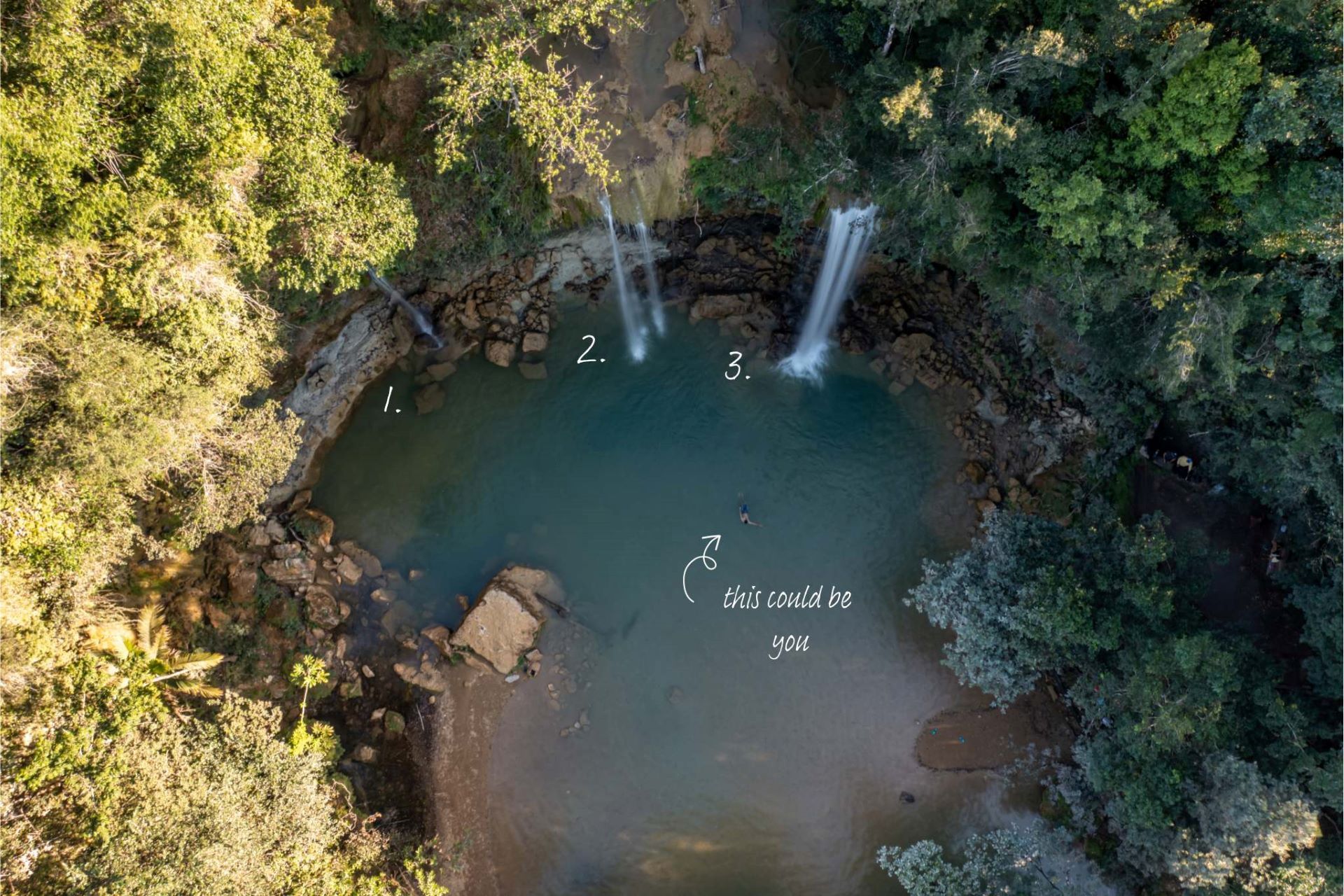 Salto Alto in the Dominican Republic, a pool with three waterfalls descending into it.
