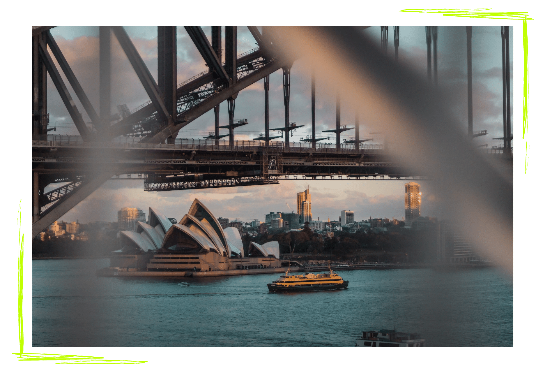 The Opera House in Sydney is framed by the Sydney Harbour Bridge.