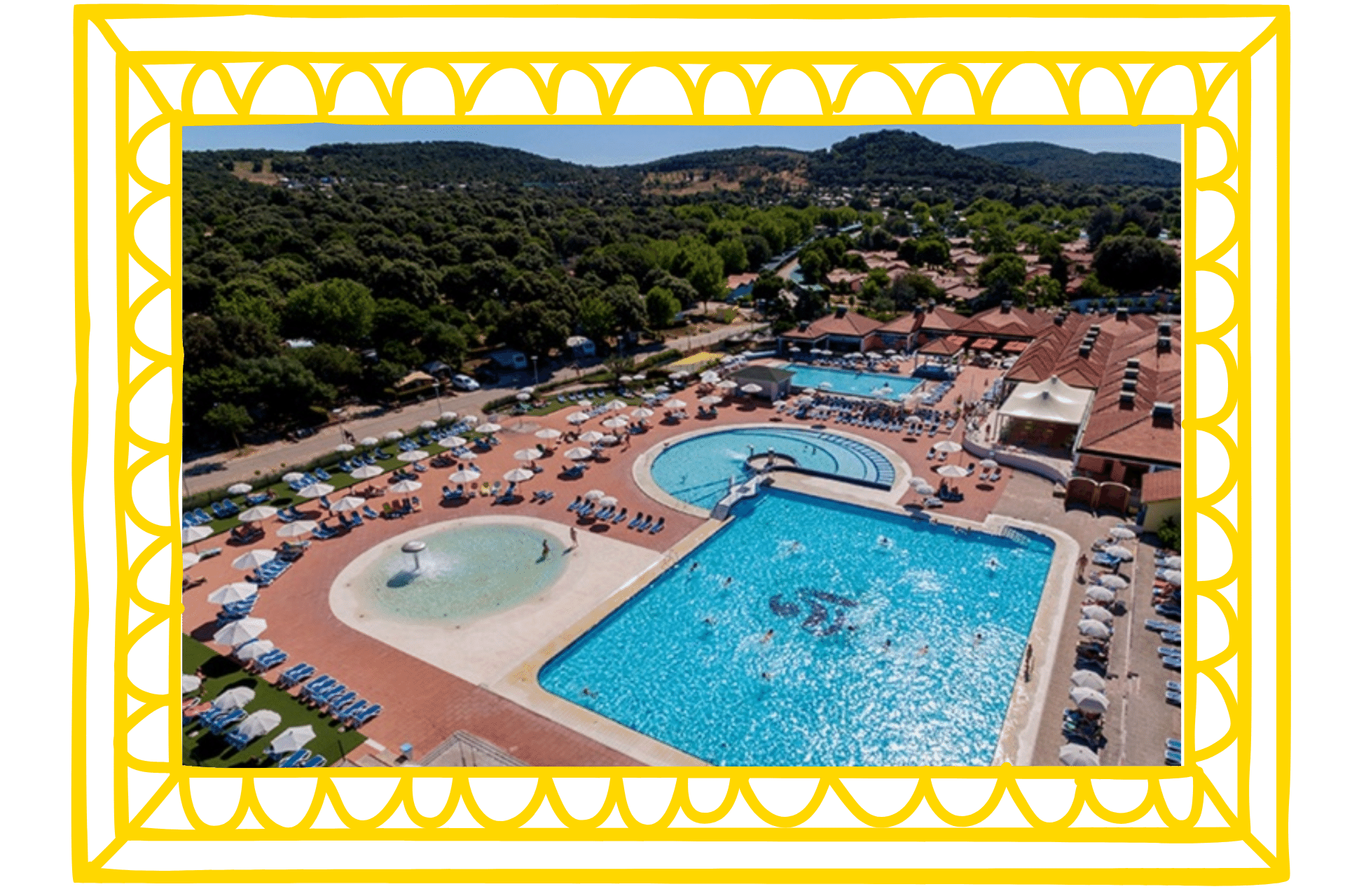 Valalta is a large nudist camp in Croatia, with one of the world's best nudist beaches. Image shows a bird's eye view of the outdoor pools at Valalta, with sunloungers around them and green mountains reaching into the distance.