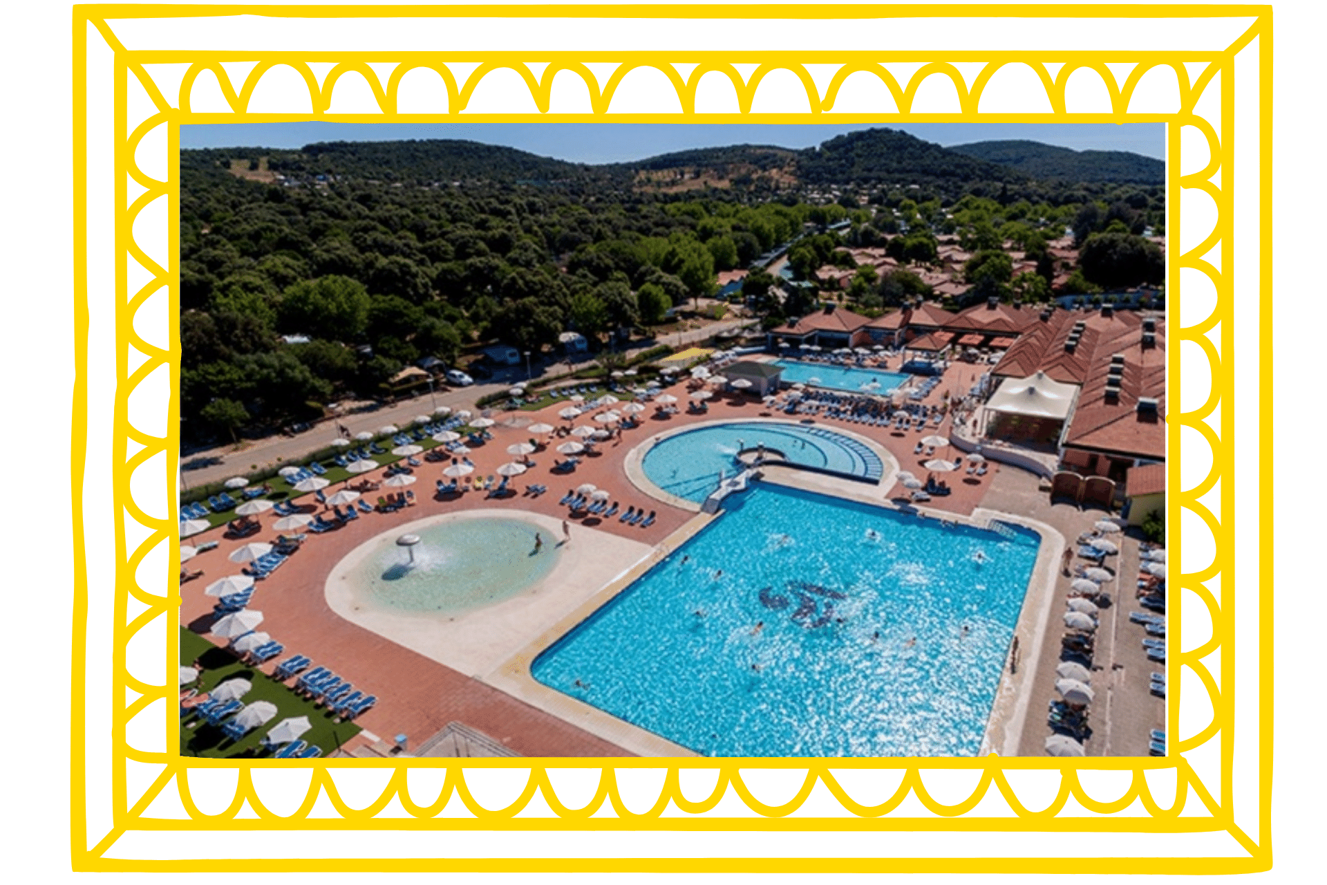 Valalta is a large nudist camp in Croatia, with one of the world's best nudist beaches. Image shows a bird's eye view of the outdoor pools at Valalta, with sunloungers around them and green mountains reaching into the distance.