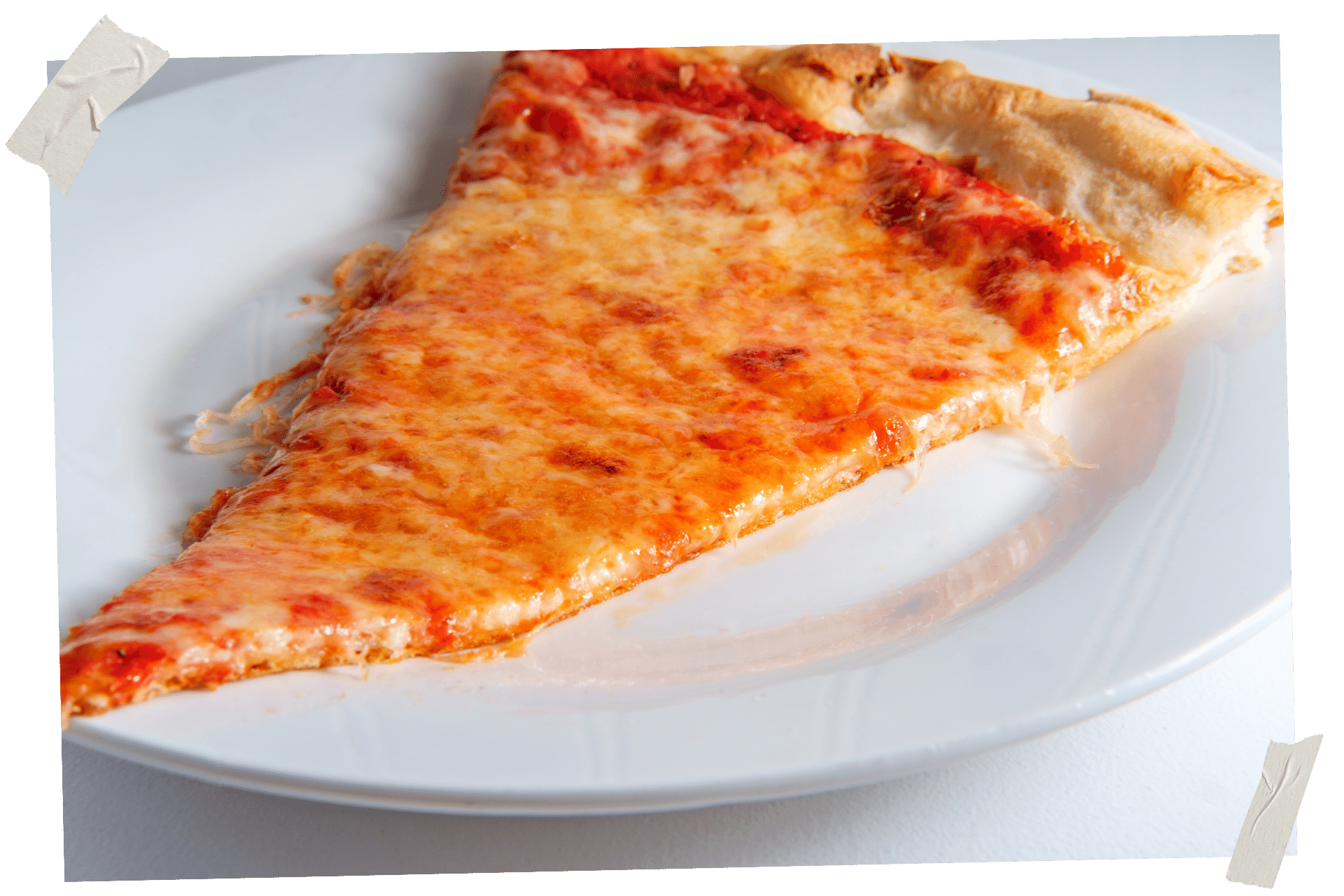 When it comes to New York for Foodies, a classic pizza slice is number one on the list. Pictured is a plane cheese slice on a white plate against a white background.